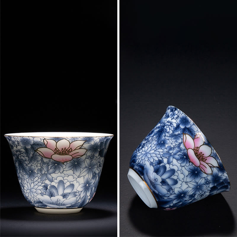 Buddha Stones、カラフルな花、蘭、海の波、青と白の磁器のティーカップ、カンフーティーカップ