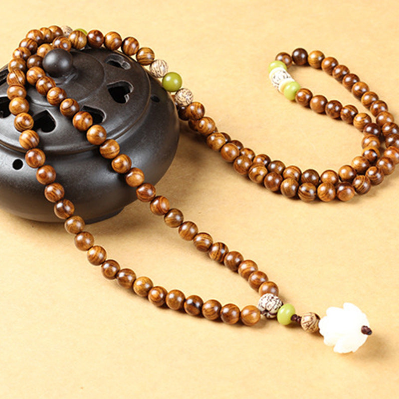Buddha Stonesチベットローズウッド蓮のMala保護鎮静ネックレスブレスレット