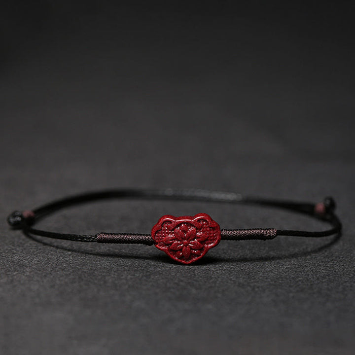 Buddha Stonesの手作り梅の花、四つ葉のクローバー、貔貅、蓮、鯉、辰砂の祝福の編み込みブレスレット