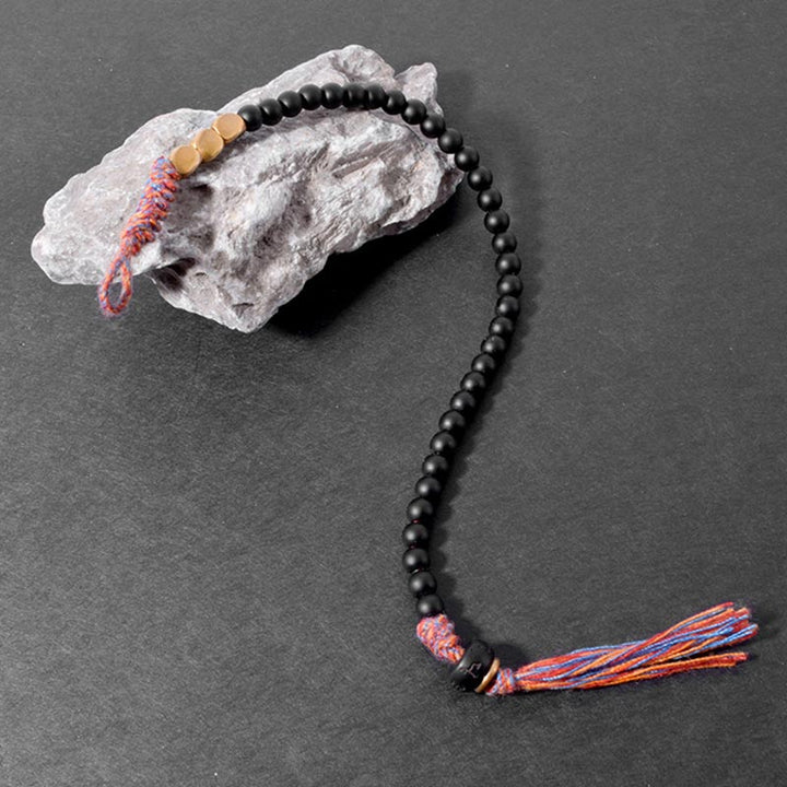 Buddha Stonesハンドメイドチベットブラックオニキスタッセルブレスレット