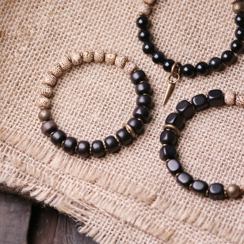 Buddha Stonesチベット菩提樹 黒曜石 黒檀 木 銅 平和ブレスレット