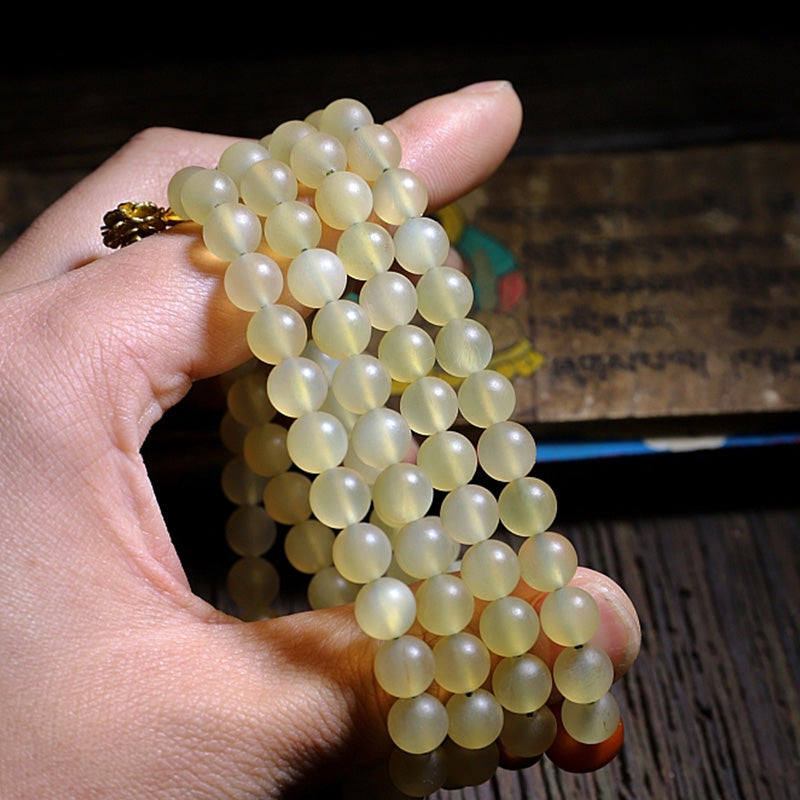 Buddha Stones108 個入りMalaビーズ チベット産 羊角琥珀 幸運のブレスレット