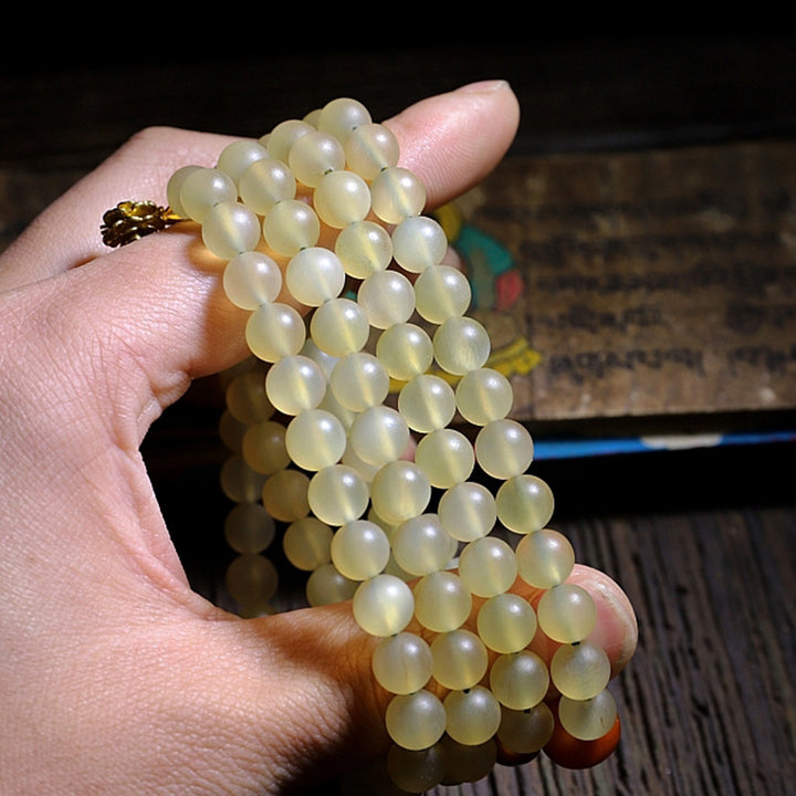 Buddha Stones108 個入りMalaビーズ チベット産 羊角琥珀 幸運のブレスレット