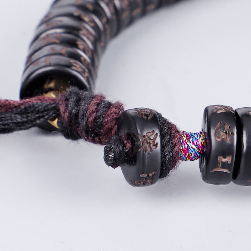 Buddha Stonesチベットココナッツシェルビーズ 彫刻入りオーム・マニ・パドメ・フムマントラ ポジティブストリングブレスレット