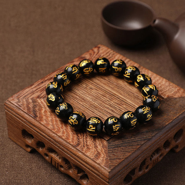 Buddha Stonesチベット ホワイトクリスタル ブラックオニキスオーム・マニ・パドメ・フム瞑想ブレスレット