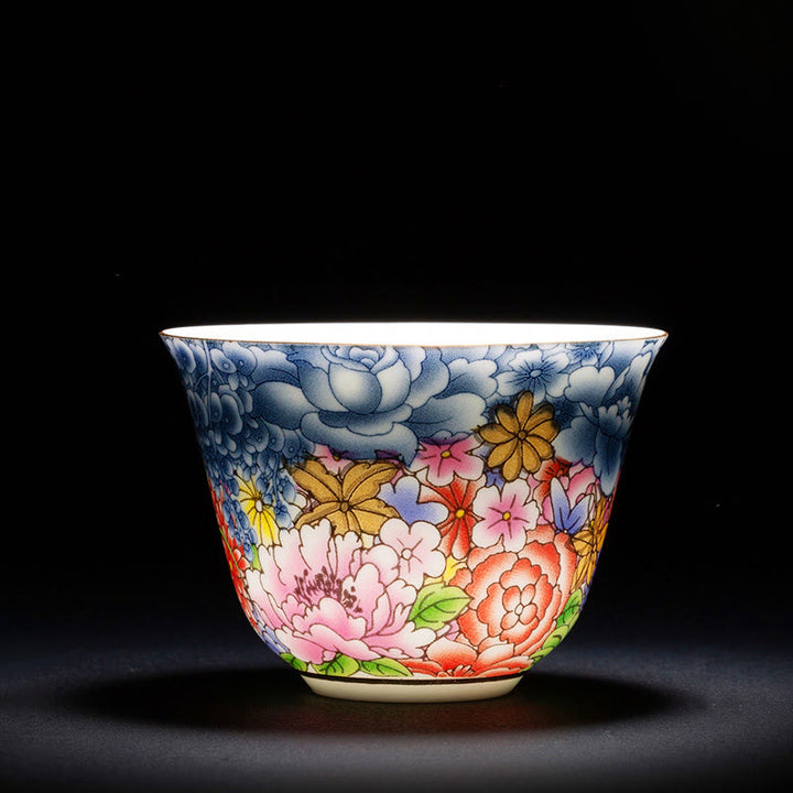 Buddha Stones、カラフルな花、蘭、海の波、青と白の磁器のティーカップ、カンフーティーカップ