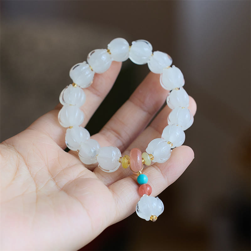 Buddha Stones琉璃ガラスビーズ 蓮の花模様 蛍石 アイボリー フルーツダンシングライオンチャーム 悟りのブレスレット