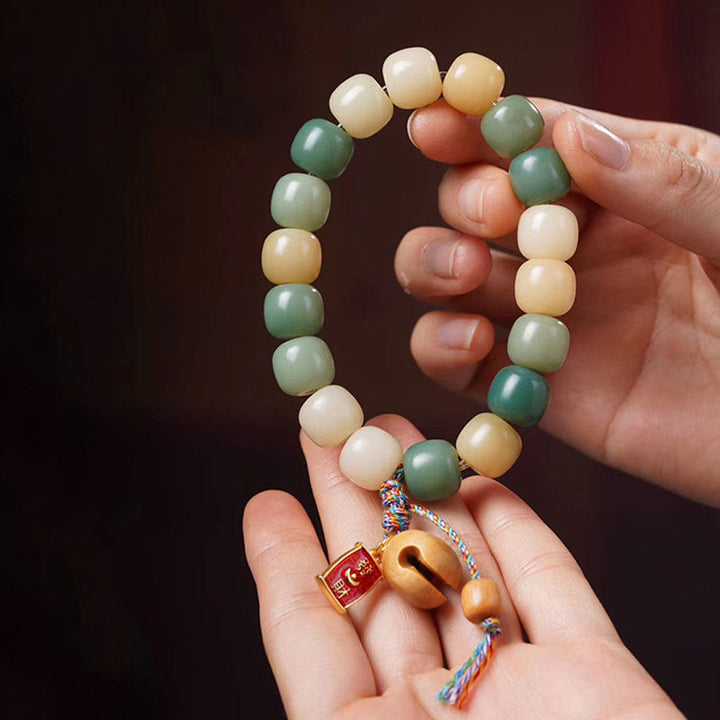 Buddha Stonesナチュラルグラデーション 菩提樹の知恵 木製 魚 ドラム チャーム ブレスレット