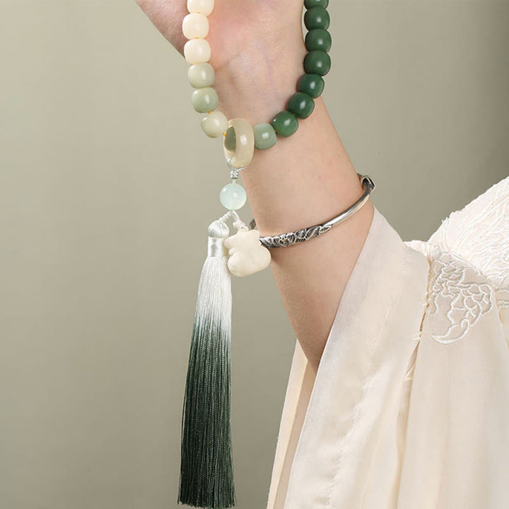 Buddha Stonesナチュラルグラデーション 菩提樹 幸運 マネーバッグ 蓮 知恵 タッセル リストMala