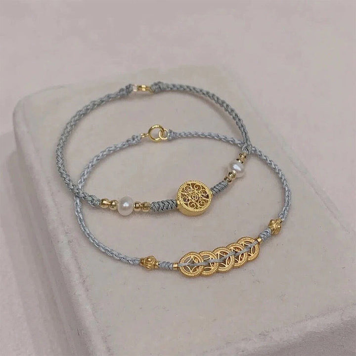 Buddha Stones、銅貨、幸運の木、真珠、幸運の青いロープ編みブレスレット