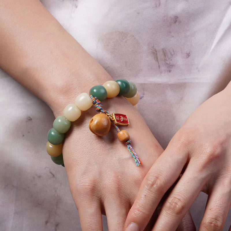 Buddha Stonesナチュラルグラデーション 菩提樹の知恵 木製 魚 ドラム チャーム ブレスレット