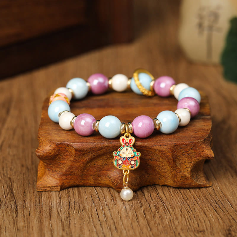 Buddha Stonesチベットのザキラム女神 富の女神 ウサギ ライオンヘッドチャーム リュウリガラスインセンス 灰磁器ビーズ 保護ブレスレット