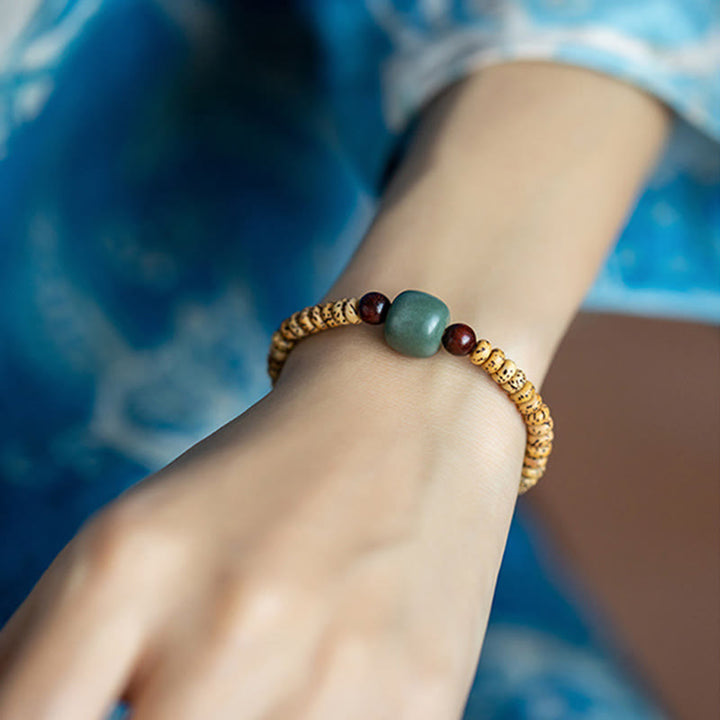 Buddha Stones菩提樹の小さな葉の紫檀の知恵のブレスレット