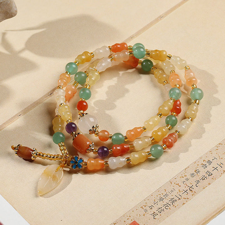 Buddha Stonesの黄金シルク翡翠ひょうたん富のブレスレット