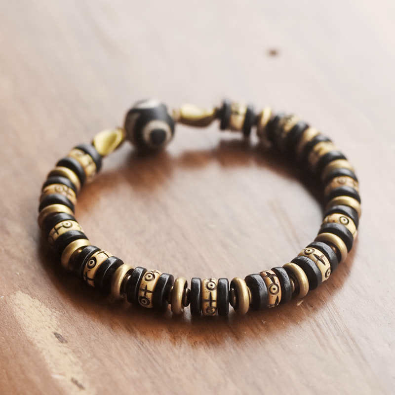 Buddha Stonesチベット骨ビーズ 黒檀 強さのブレスレット