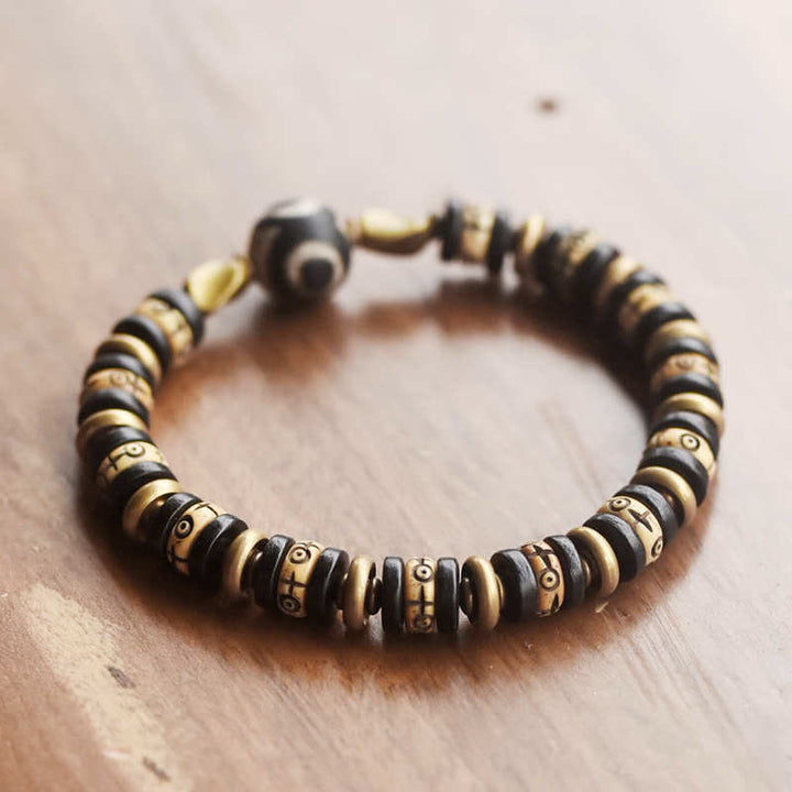 Buddha Stonesチベット骨ビーズ 黒檀 強さのブレスレット