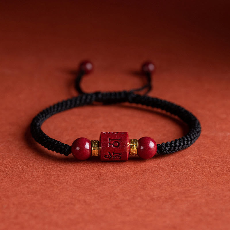 Buddha Stonesチベット 辰砂オーム・マニ・パドメ・フム刻印入り 祝福 編み込み ブレスレット