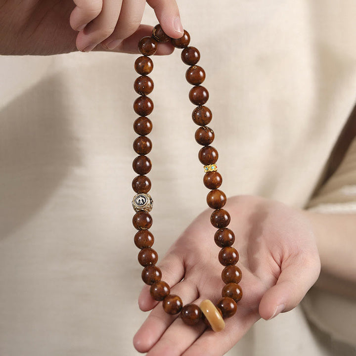Buddha Stonesチベット天然紫金鼠菩提樹の富ダブルラップブレスレット