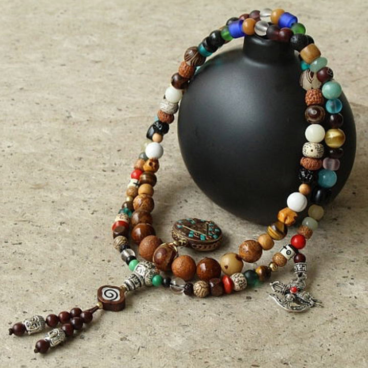 チベットのBuddha Stones108個のMala、九宮八卦菩提樹の実、ヤクの骨の金剛杵、調和のブレスレット