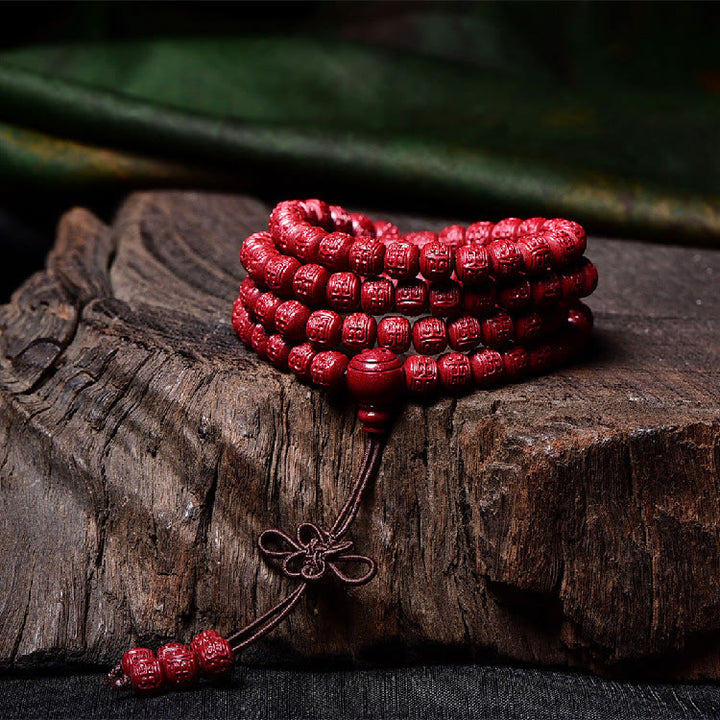 Buddha Stones 108Malaビーズ 辰砂Om Mani Padme Hum模様 刻印入り 祝福ブレスレット