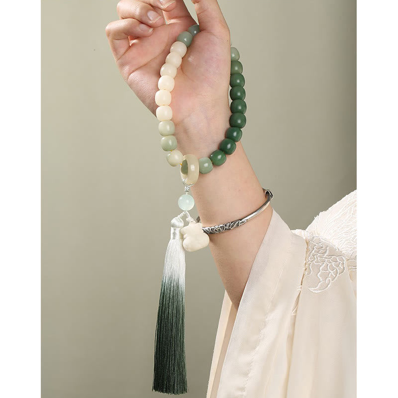 Buddha Stonesナチュラルグラデーション 菩提樹 幸運 マネーバッグ 蓮 知恵 タッセル リストMala