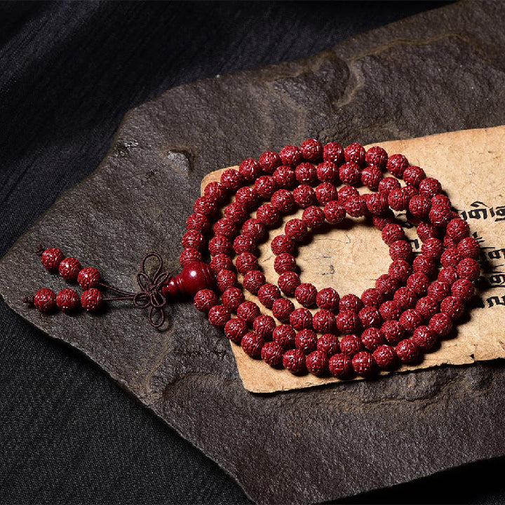 Buddha Stones 108Malaビーズ 辰砂Om Mani Padme Hum模様 刻印入り 祝福ブレスレット