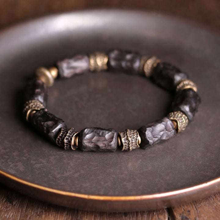 Buddha Stonesチベット黒檀 銅 穏やかで平和なブレスレット