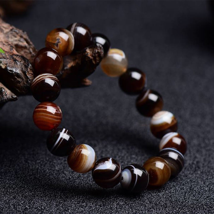 Buddha Stonesチベット産サードニクス 幸福のポジティブなブレスレット
