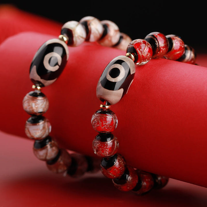 Buddha Stonesチベット九眼珠三眼珠琉璃ガラス玉富のブレスレット