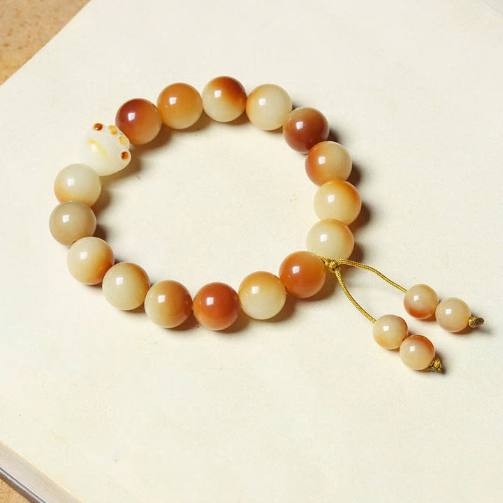 Buddha Stones天然菩提樹の実 愛らしい足爪 平和 知恵 ブレスレット