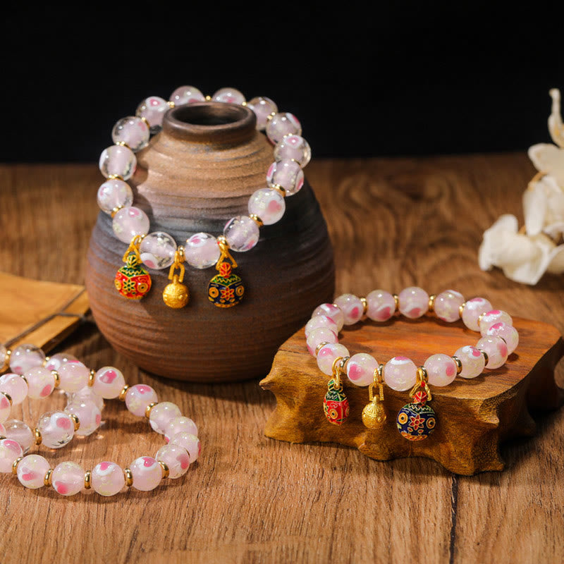 Buddha Stonesゴールド 呑み込み獣 ファミリーチャーム 光るピンク ラブハート 蛍光 Liuli ガラスビーズ 祝福ブレスレット