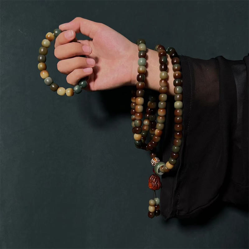 Buddha Stones108 個のMalaビーズ 菩提樹の種 平和の知恵のブレスレット リストMalaポケットMala