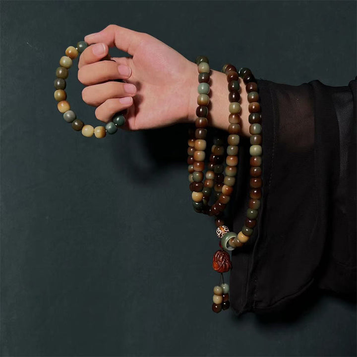 Buddha Stones108 個のMalaビーズ 菩提樹の種 平和の知恵のブレスレット リストMalaポケットMala