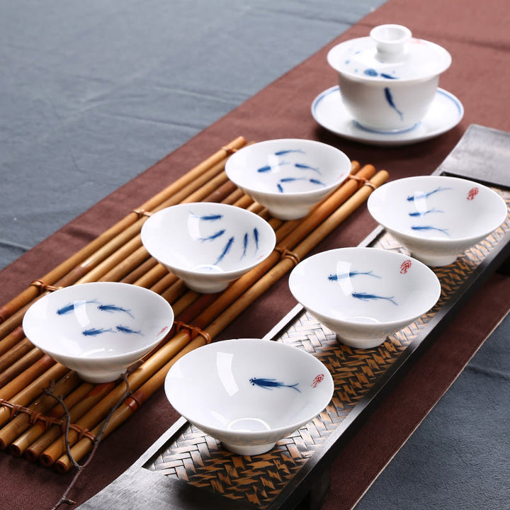 Buddha Stonesの青白磁の鯉の陶器ティーカップ、カンフーティーカップ