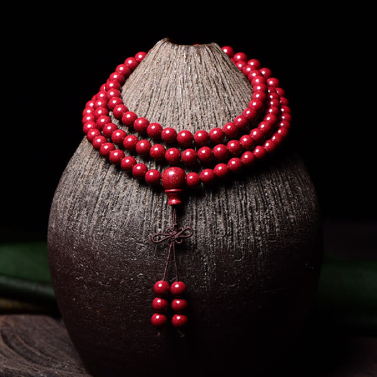 Buddha Stones 108Malaビーズ 辰砂Om Mani Padme Hum模様 刻印入り 祝福ブレスレット