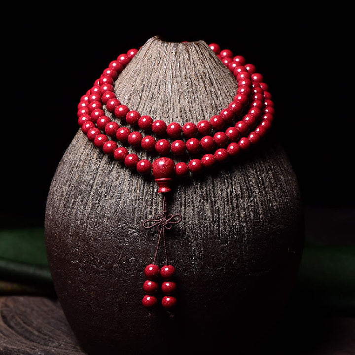 Buddha Stones 108Malaビーズ 辰砂Om Mani Padme Hum模様 刻印入り 祝福ブレスレット