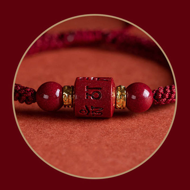Buddha Stonesチベット 辰砂オーム・マニ・パドメ・フム刻印入り 祝福 編み込み ブレスレット