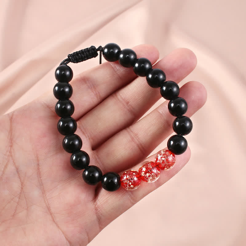 Buddha Stonesブラックオブシディアン 光るグロウストーン 強さのブレスレット