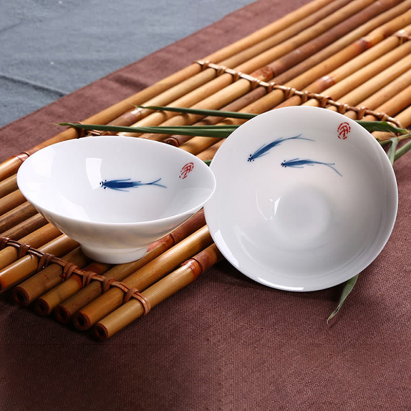 Buddha Stonesの青白磁の鯉の陶器ティーカップ、カンフーティーカップ