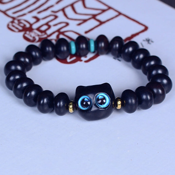 Buddha Stones、黒檀、琉璃ガラス、愛らしい猫の平和バランスブレスレット - image 2