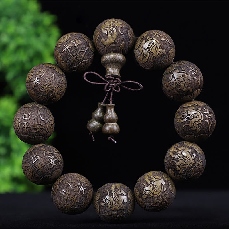 Buddha Stones、中国の十二支、ローズウッド、黒檀、銅貨、貔貅の彫刻、温もりのブレスレット