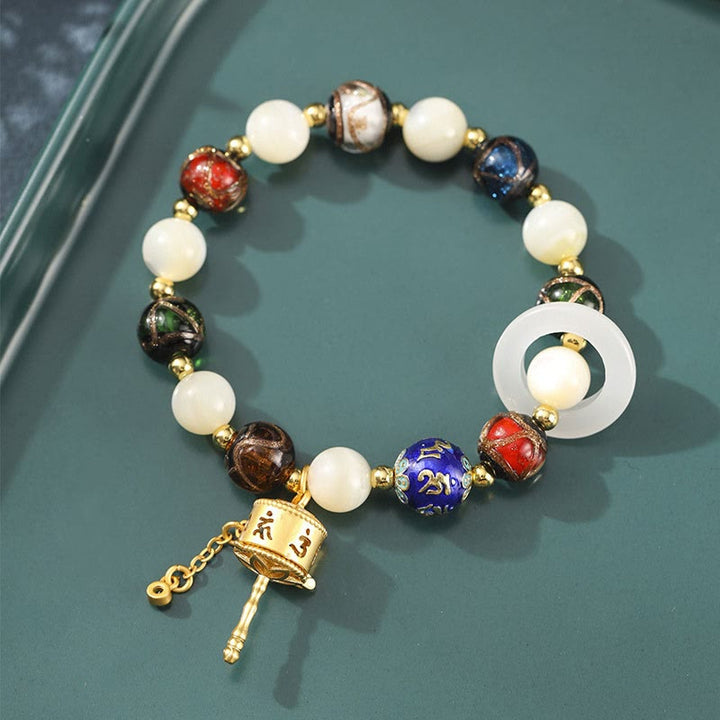 Buddha Stonesチベットのお香灰 リュウリガラス シャコガイ石 太陽石オーム・マニ・パドメ・フム祈祷ホイールチャームブレスレット