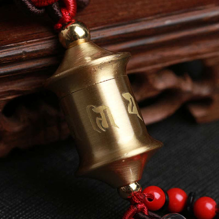 チベットのBuddha Stones、Om Mani Padme Humの祈りの車、九宮八卦の銅車吊り下げ装飾