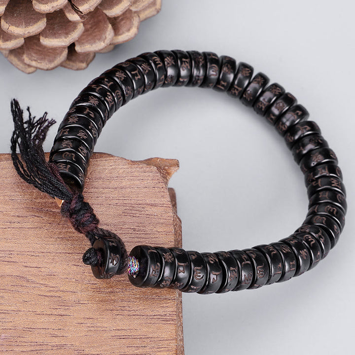 Buddha Stonesチベットココナッツシェルビーズ 彫刻入りオーム・マニ・パドメ・フムマントラ ポジティブストリングブレスレット