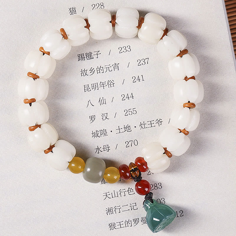 天然菩提樹レッドアゲート菩提樹の穏やかな調和の彫刻が施されたパンプキンビーズの蓮のブレスレット
