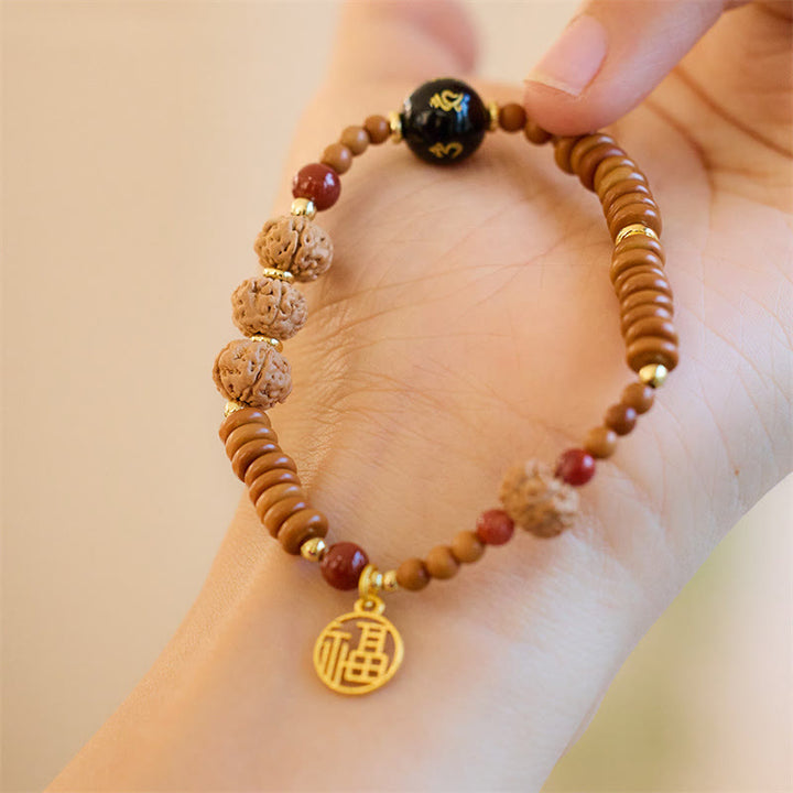 Buddha Stonesチベット菩提樹の種子 ブラックオニキス スモーキークォーツオーム・マニ・パドメ・フムフー キャラクター開運財運ブレスレット