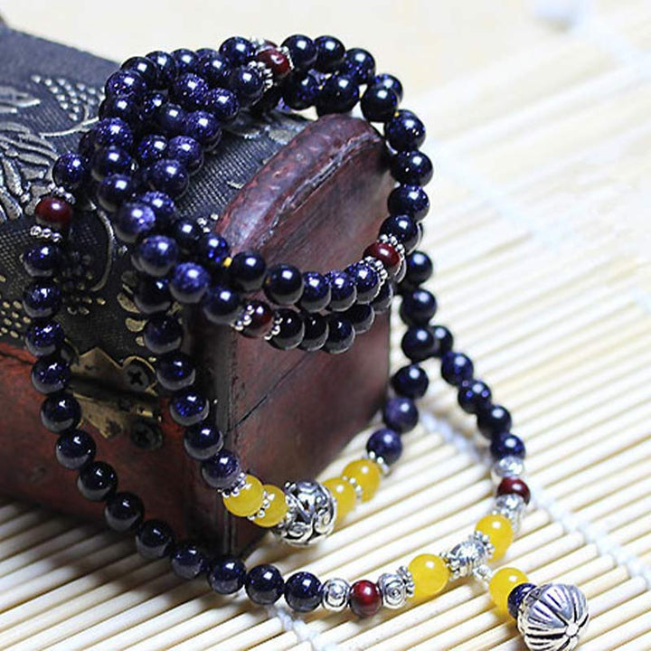 Buddha Stonesブルーサンドストーン 富のチャームブレスレットMala