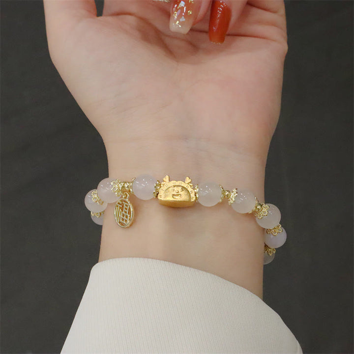 Buddha Stones赤瑪瑙 ストロベリークォーツ 黒曜石 翡翠 ガーネット 真珠 辰砂 団子型 龍 幸運 福 キャラクター ブレスレット - image 9