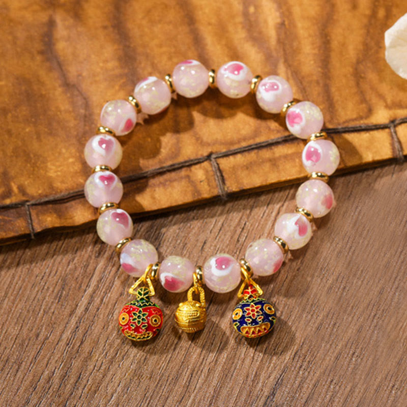 Buddha Stonesゴールド 呑み込み獣 ファミリーチャーム 光るピンク ラブハート 蛍光 Liuli ガラスビーズ 祝福ブレスレット