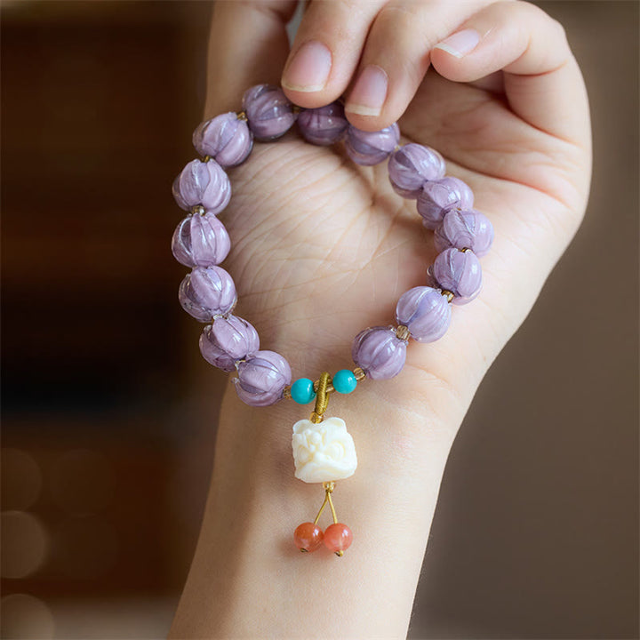 Buddha Stones琉璃ガラスビーズ 蓮の花模様 蛍石 アイボリー フルーツダンシングライオンチャーム 悟りのブレスレット